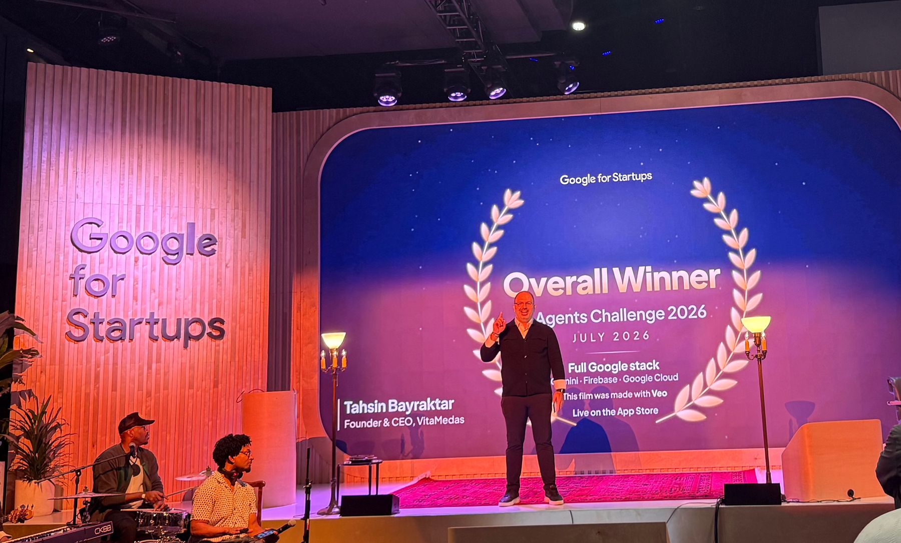 Tahsin Bayraktar on the Google for Startups stage at SF Tech Week, in front of the Overall Winner — AI Agents Challenge 2026 slide